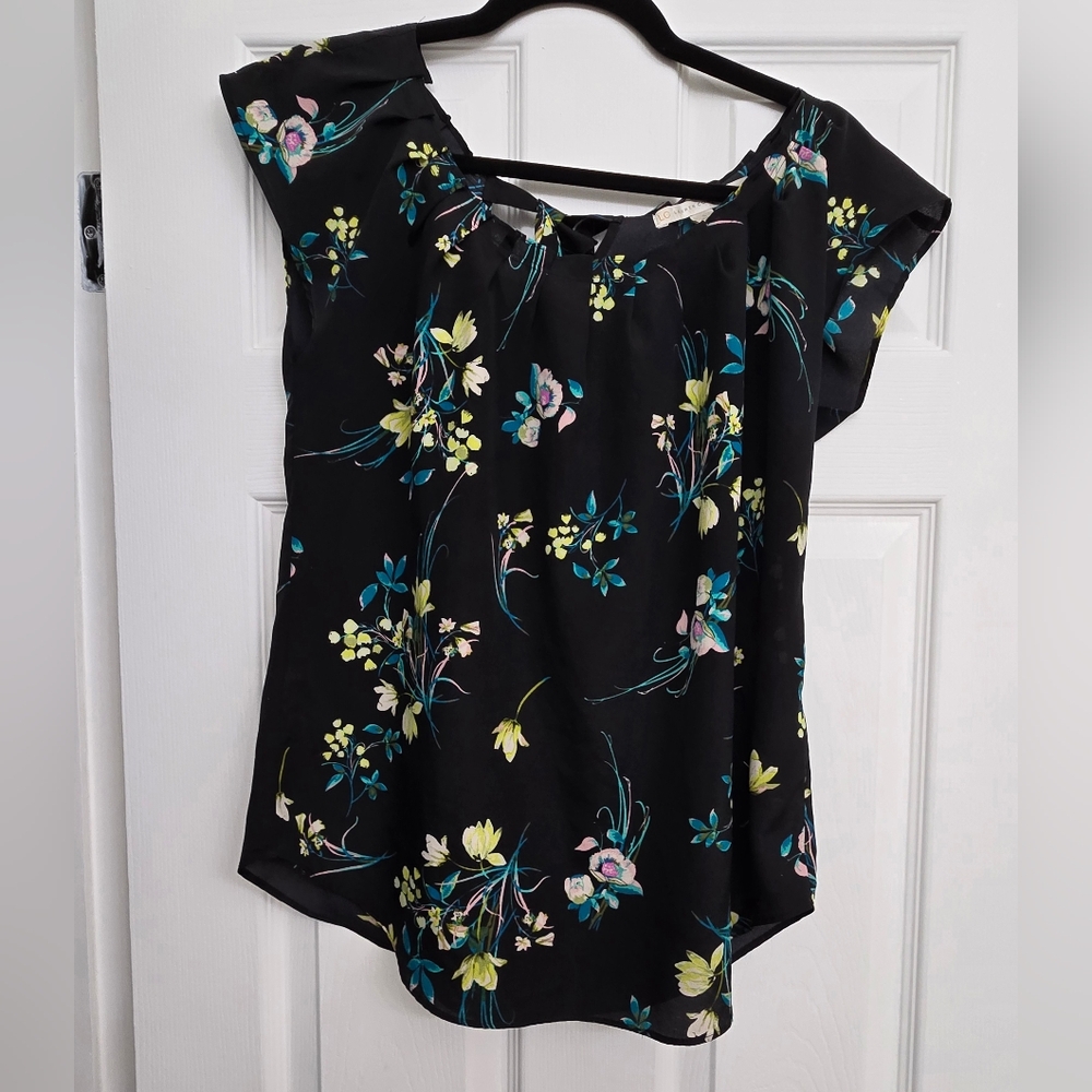 Lauren Conrad blouse.  Small, black background, pleated neckline with tie openin